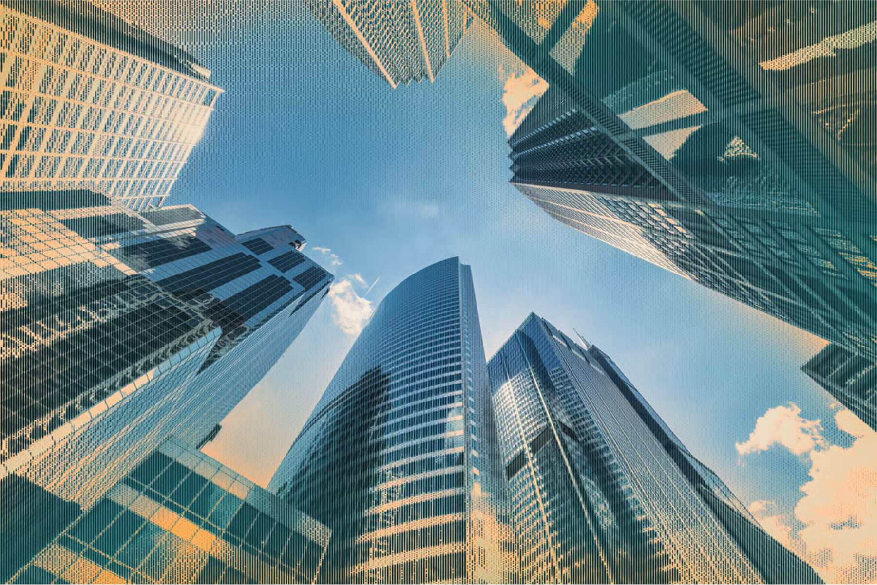 Skyscrapers with glass facades reflecting the sky, representing corporate mergers and acquisitions.