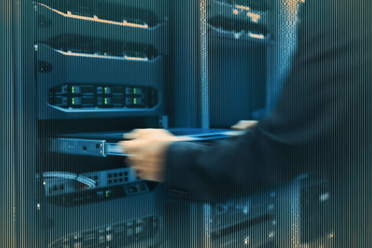 A person manages enterprise network servers and switches in a data center with a digital overlay of network connections.