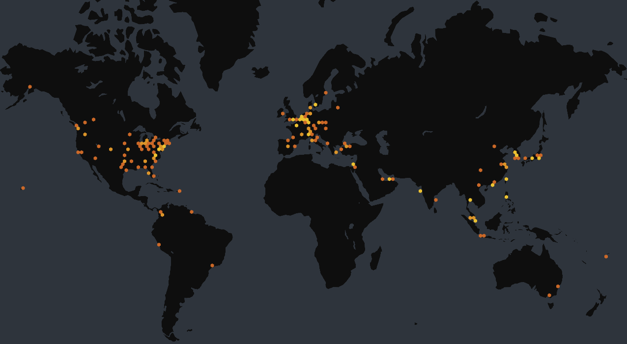 Clusters of orange and yellow dots are concentrated in Europe, North America, and parts of Asia on a dark world map.